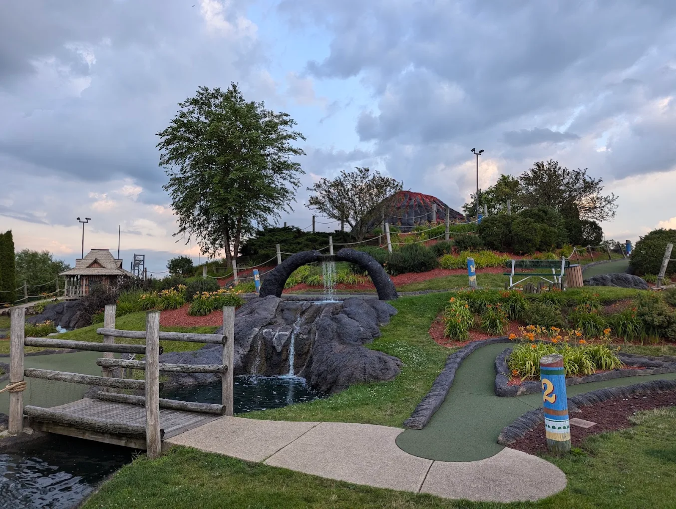 Wide view of the Volcano Falls mini golf course at dusk